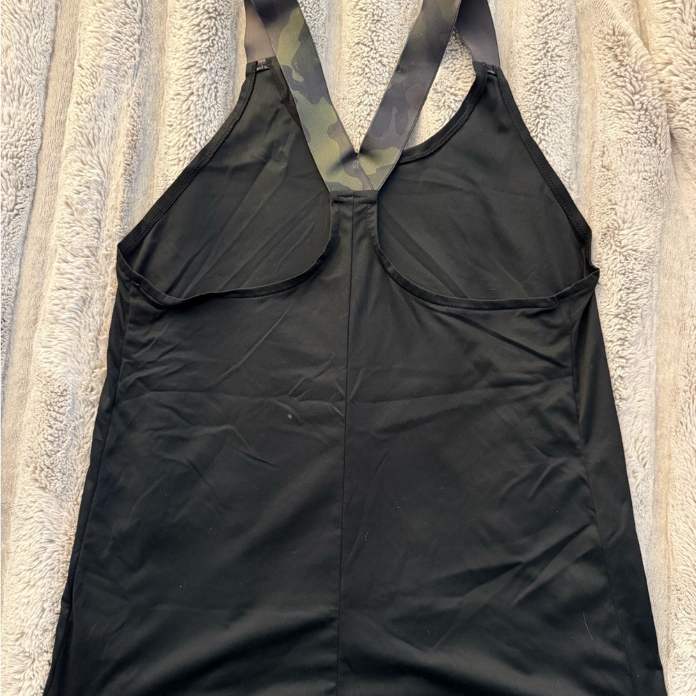 Nike tank top. Camo straps.